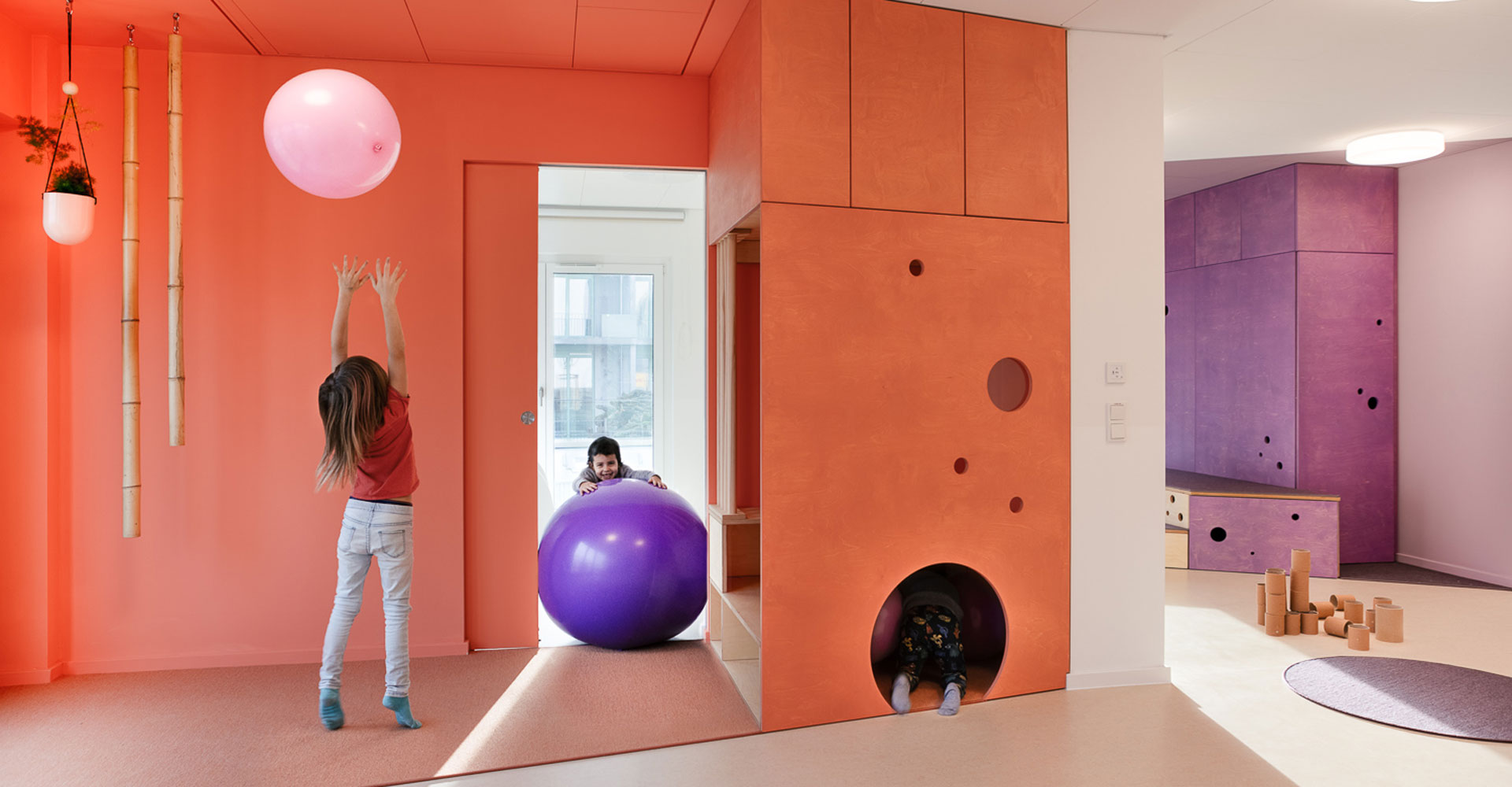 baukind-kita-weltenbummler-orange-slider